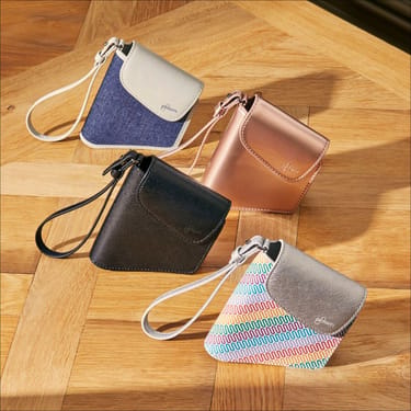 Side view of a range of Ploom AURA Duo Carry Cases