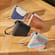 Side view of a range of Ploom AURA Duo Carry Cases