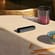 جهاز Ploom AURA Jet Black الأنيق هو رفيق خفي على الطاولة