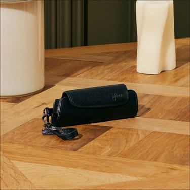 Ploom Aura Jet Black Solo Carry Case accessory on a table